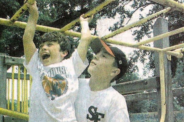 Newspaper scan from The Daphne Bulletin; children playing on monkey bars