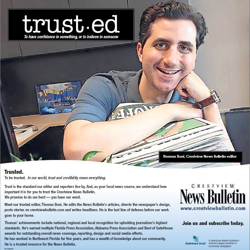 Thomas Boni, seen at the Crestview News Bulletin office in Crestview, Florida, leaning against a stack of newspapers