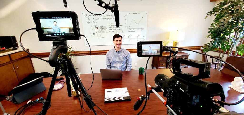 Thomas Boni, sitting in the Today's Homeowner Media conference room, while taping brand promos about the staff.