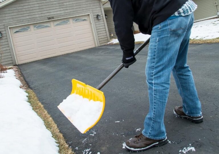 Person shoveling snow during the winter.